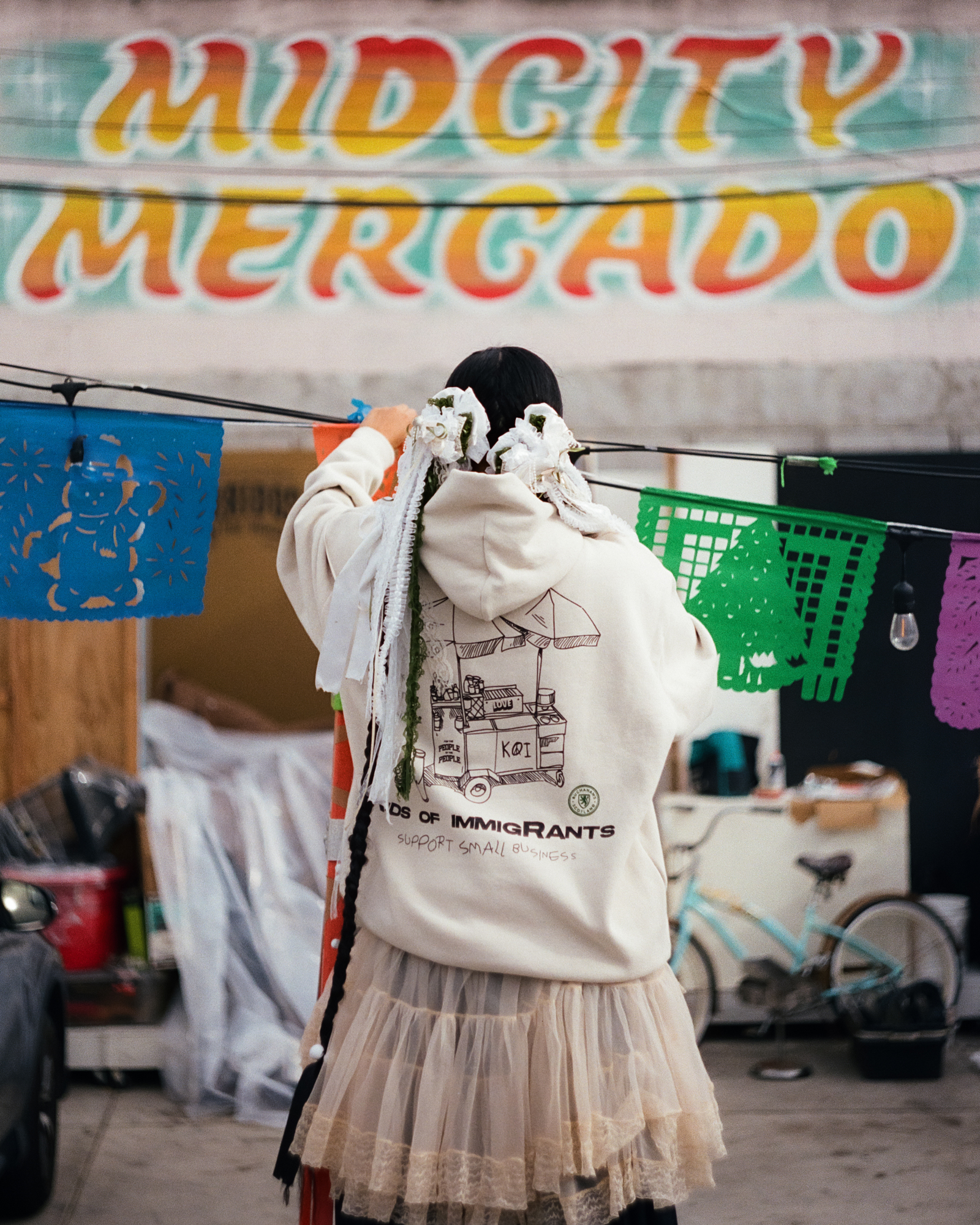 Kids of Immigrants Holiday Capsule Hoodie, Photograph by David Camarena